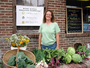 Jane with a Harvest of her Spring Vegetables