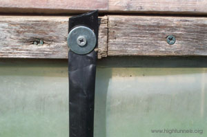 Figure 13. A drip tape strip from hip board to base board at each hoop can keep side walls from billowing.